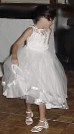 The Flowergirl  has fun dancing